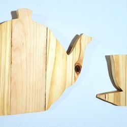 Wooden Tea Kettle, Cup, And Saucer