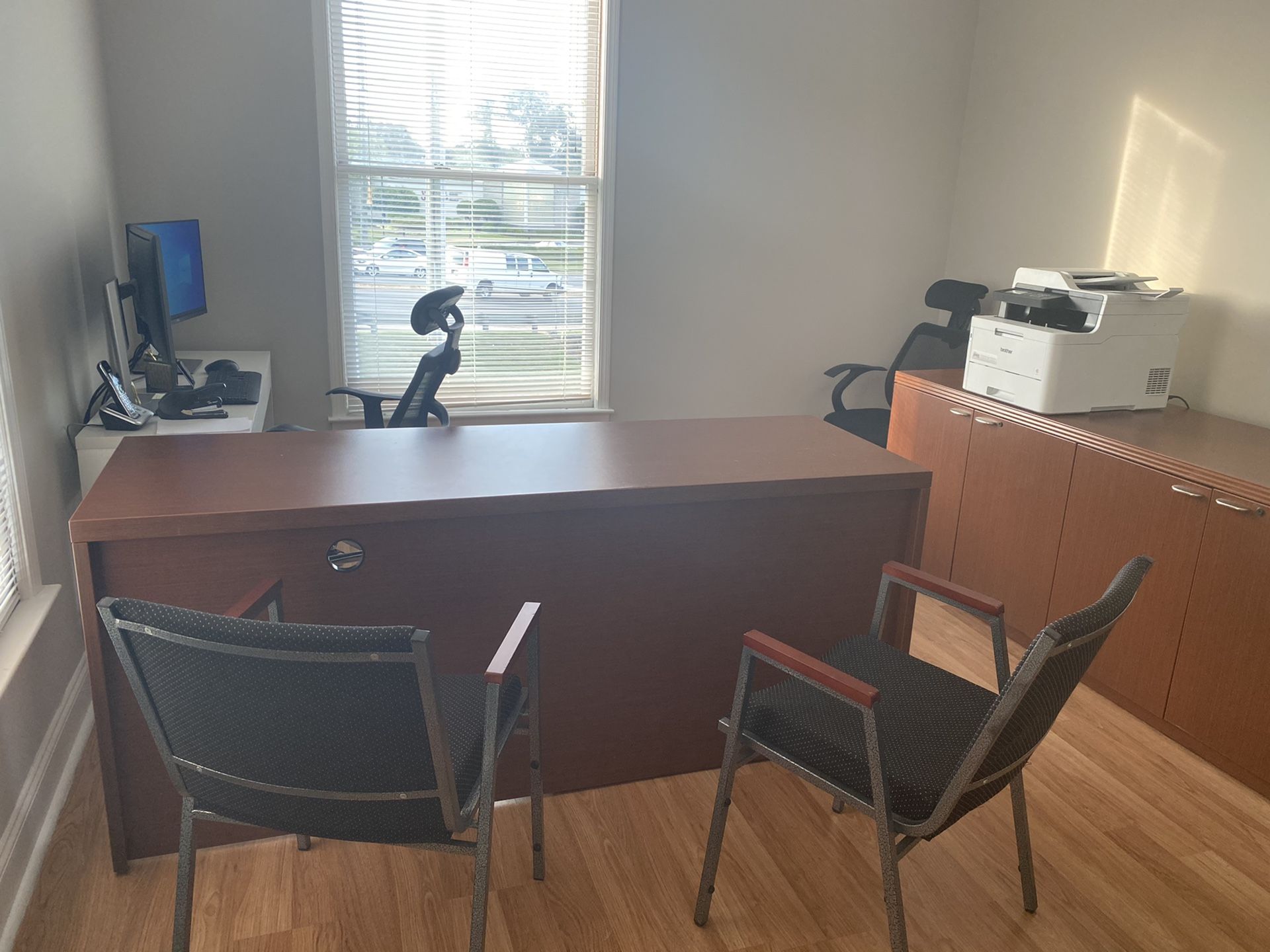 Office desk and file cabinets