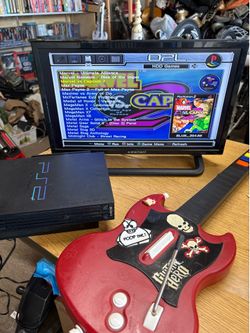 Sony PlayStation 2 & guitar