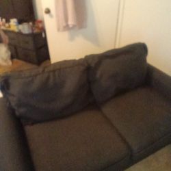 Black Love Seat Sleeper  . Excellent Condition