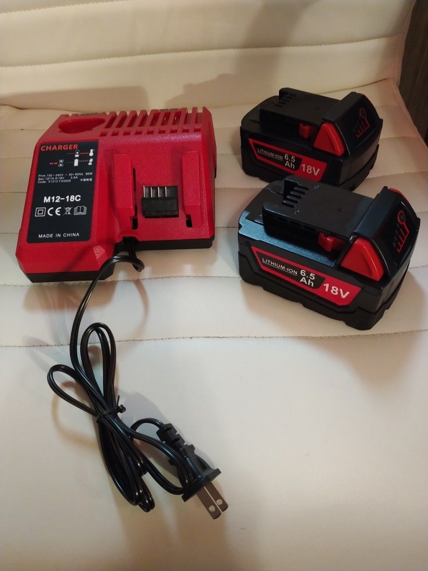 2 Milwaukee 18 Volt Replacement Batteries With Charger