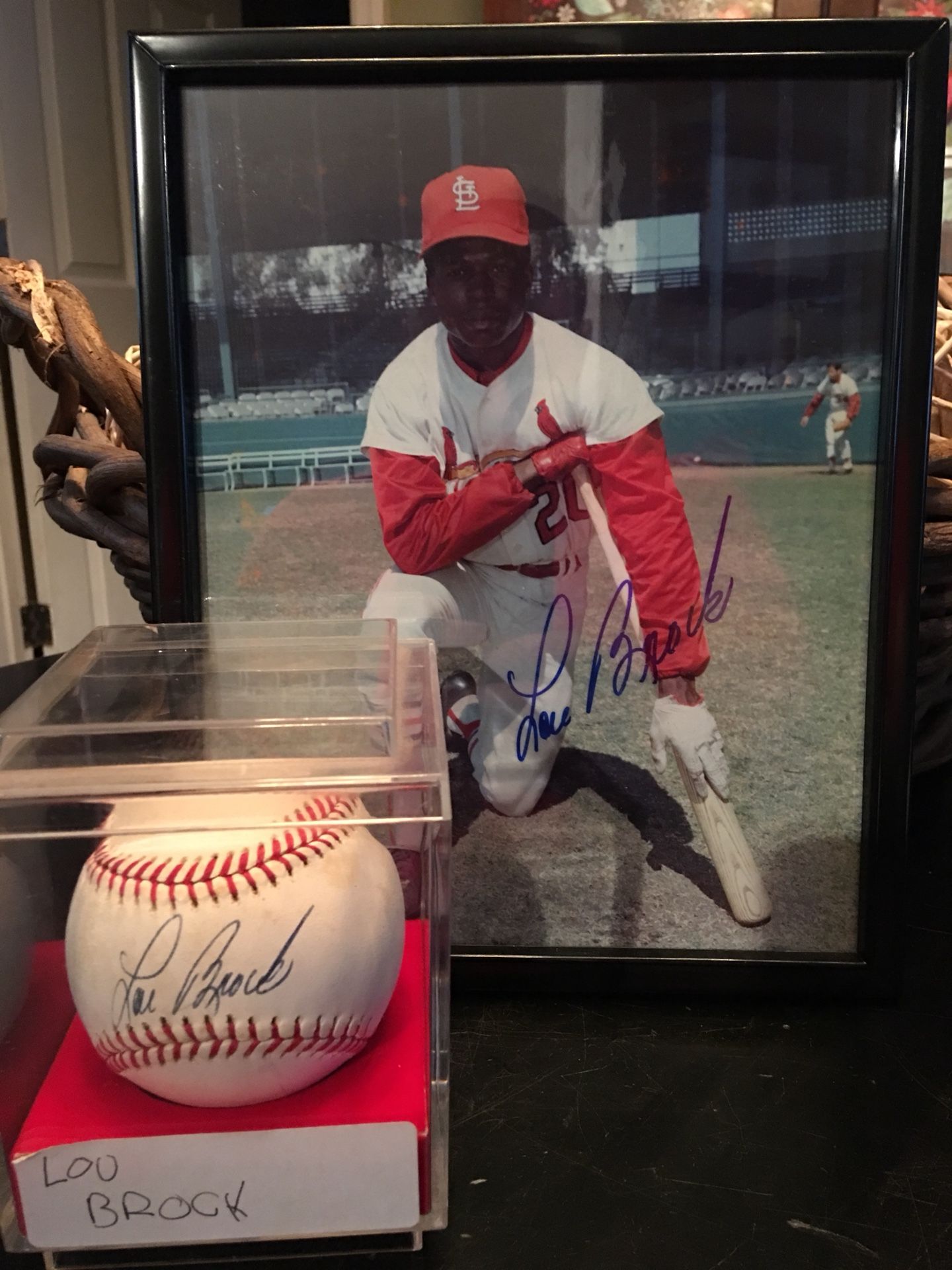 Lou Brock autographed baseball and framed photo