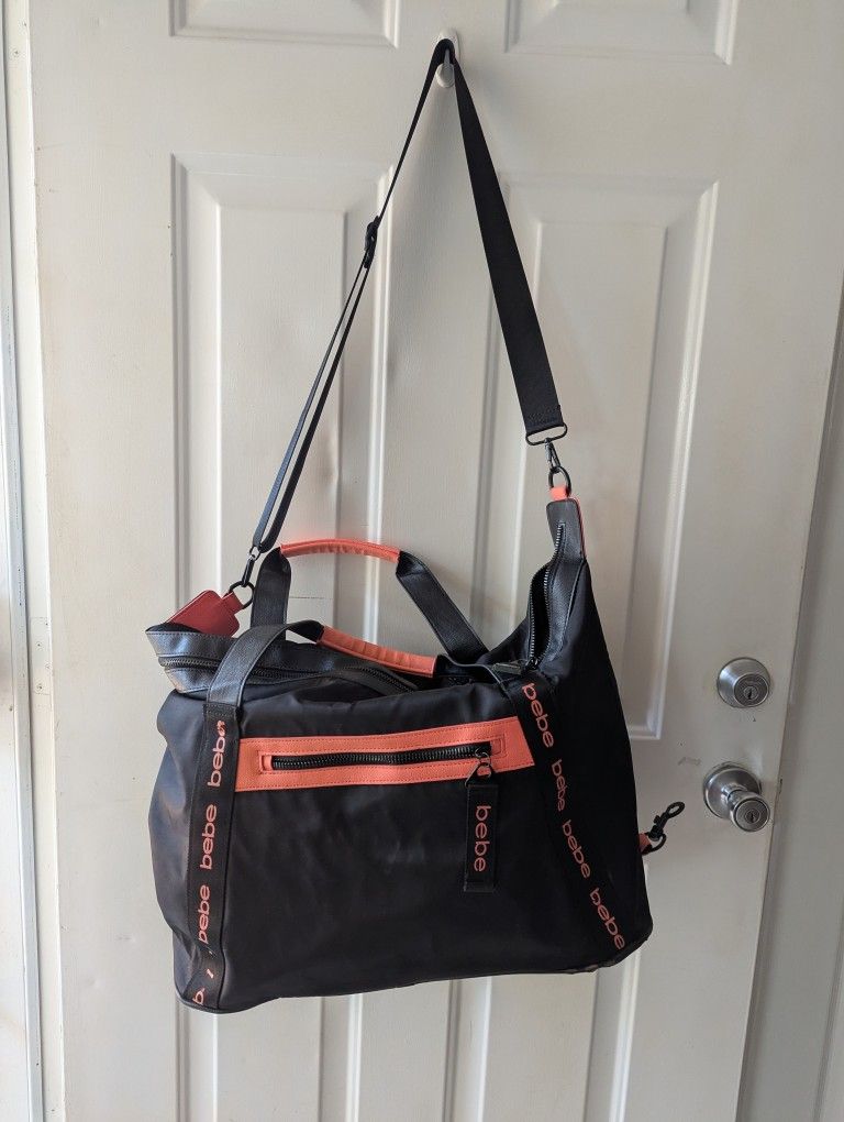 Bebe Duffle Bag height 14 width 24 . $35
