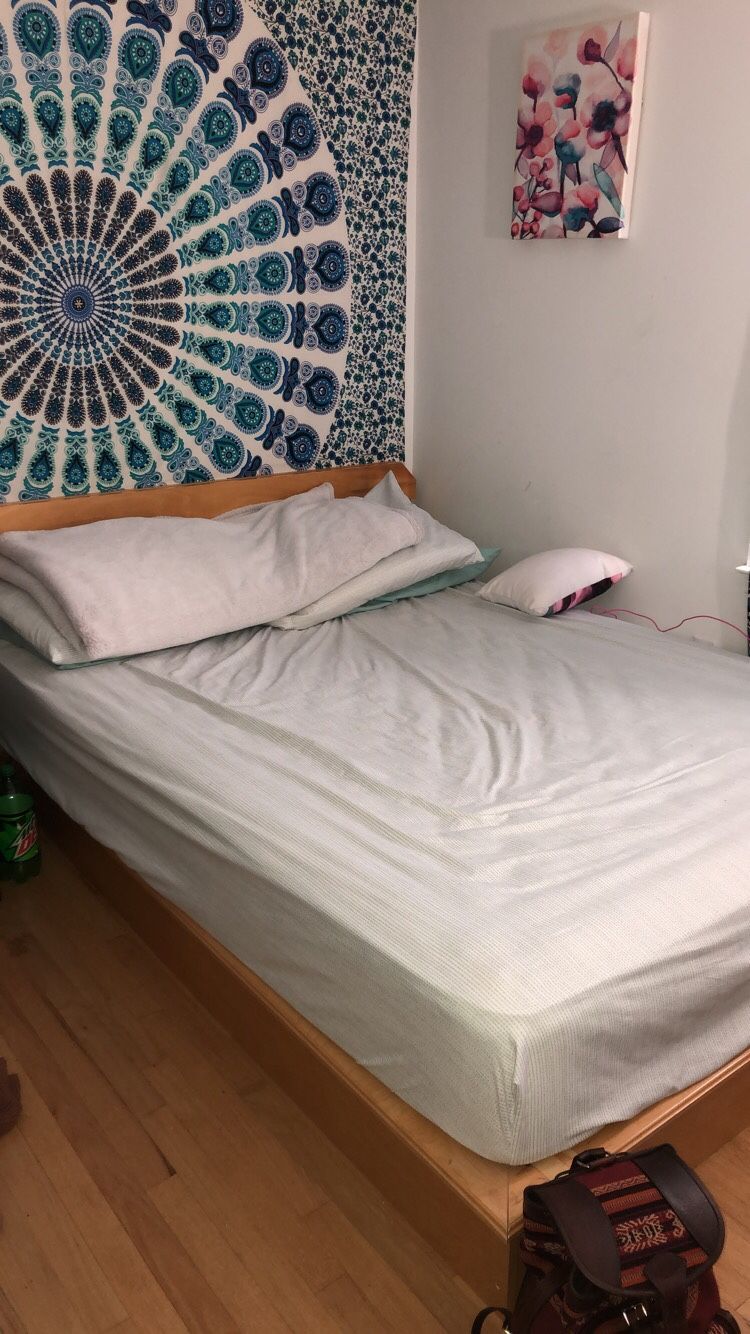 FREE queen size bed frame and mattress.