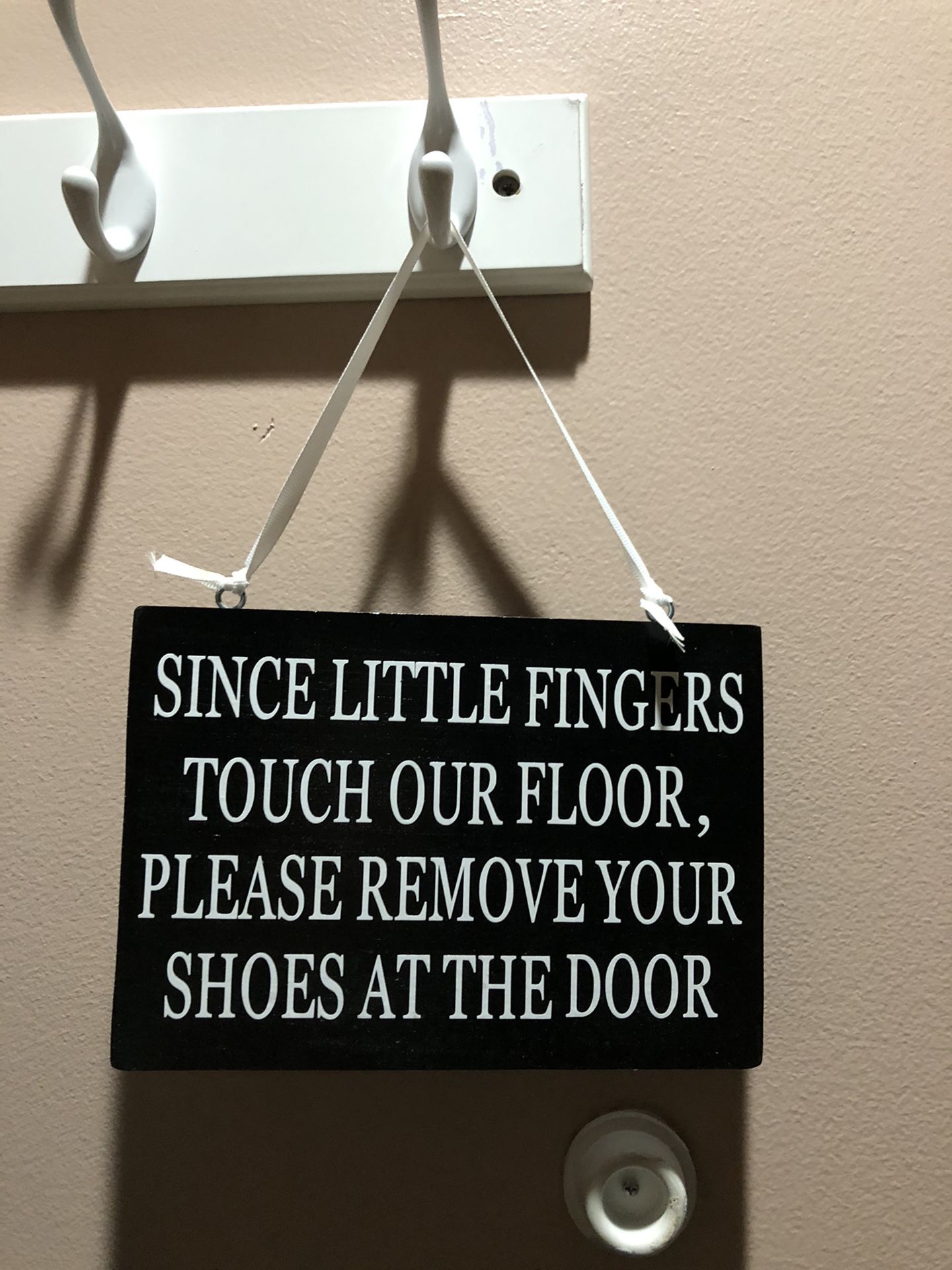 Since little fingers touch the floor, please remove your shoes at the door sign/ door hanger