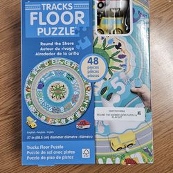 NEW IN BOX Melissa & Doug Round the Shore Tracks Cardboard Jigsaw Floor Puzzle and Wind-Up Vehicles – 48 Pieces, for Boys and Girls 4+.