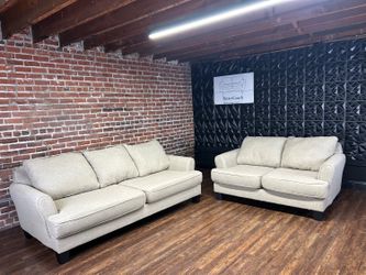 Delivery Available beige sofa/couch + loveseat