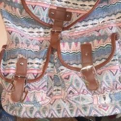 Back Pack  2 Pockets In Front And Straps