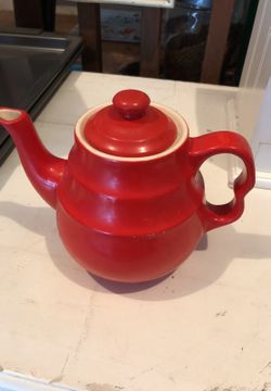 Red tea pot, signs