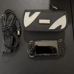 PSP-2000 w/ Carrying Case, Games, and Movies
