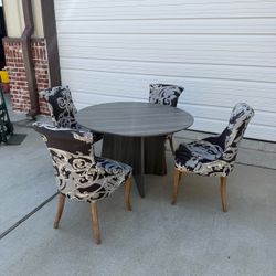 Very nice table and 4 Matching Chairs. Table is GREAT condition  the chairs are very strong and sturdy and comfortable. The fabric has some stains. So
