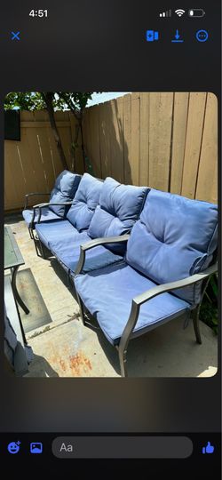 blue outdoor chairs and table set