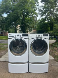 Whirlpool duet frontload washer and dryer set on pedestals