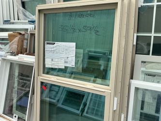 35 1/2 x 59 1/2 beige windows $180 each 2 available