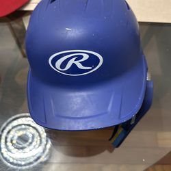 6 7/8 -7 5/8 Rawlings Blue adjustable flap righty batter helmet