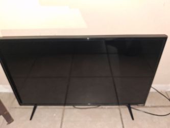 Flat Screen TV with Stand