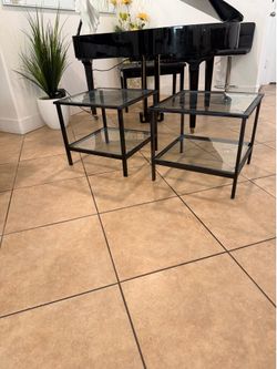 2 side tables! Made of quality iron and glass