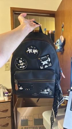 Coach/disney leather backpack