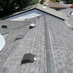 New Shingles Roofer