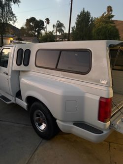 Ford 1992 f150 flare side camper