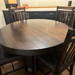 54 inch round dining room Table (Levin’s) 
