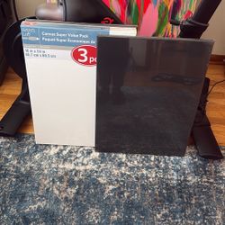 (5) 18x24 Blank Canvases. (2) Black (3) White