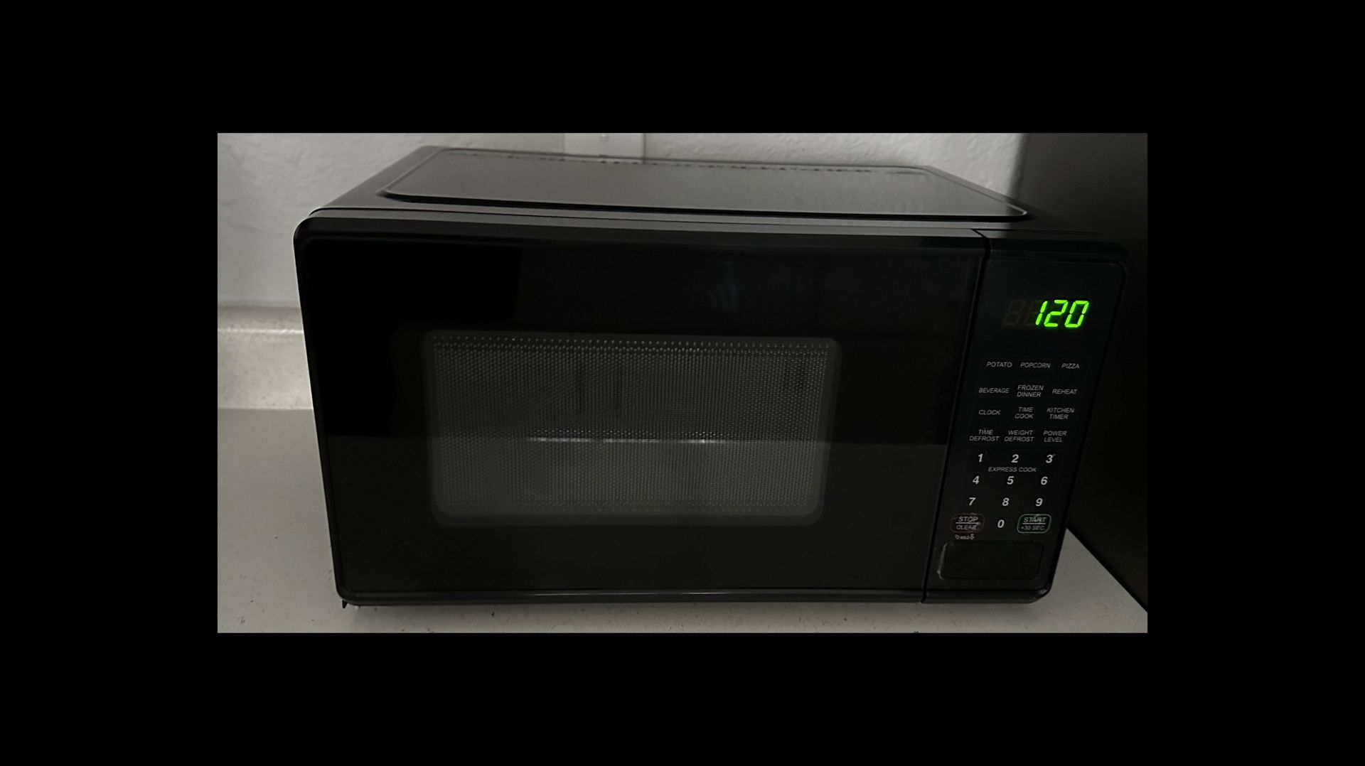 Mainstays 0.7 Cu ft Countertop Microwave Oven, 700 Watts, Black