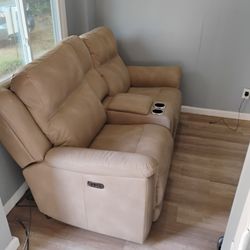 Brand New Ashley Furniture Love Seat.