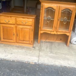 China cabinet with electrical light hooked up top and bottom. Perfect condition with six piece. Matching table, all wood. Great condition. . St strong