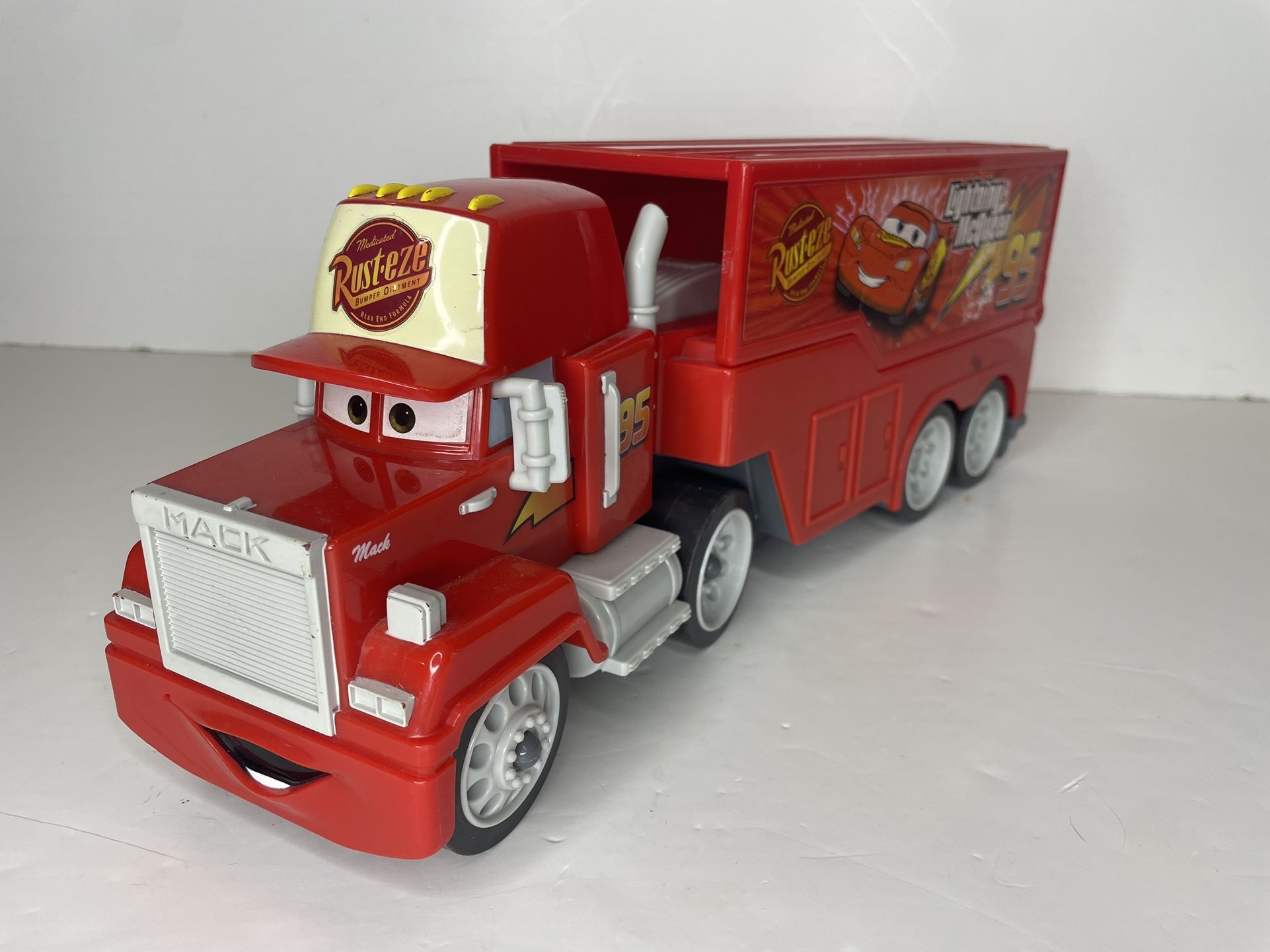 Disney Pixar cars Mack truck hauler transforming track