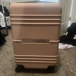 Travelers Club 22" Richmond Spinner Carry-On Luggage, Rose Gold, 