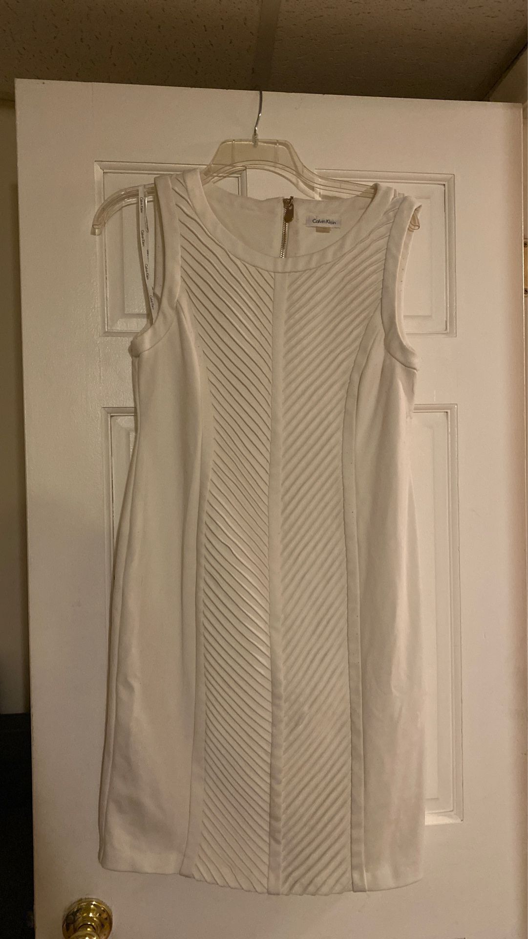 Cream color Calvin Klein dress with gold zipper in the back size 10-12