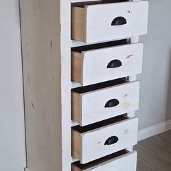 Distressed White Wood Lingerie Dresser. Used, in very good condition. 
All drawers glide smoothly. 

Decor Not Included 

24"W x 18"D x 53"H 

$165