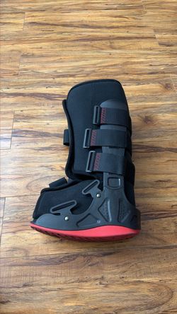 Xcel Trax Orthopedic leg boot and crutches.