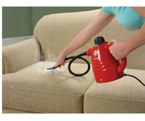 Available Now if You are Viewing -Want to kill Germs, etc..Killem with hot steam - Nearly New Hand-Held Dirt Devil Steam Cleaner - With Attachments
