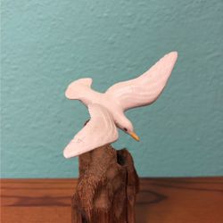 Miniature Seagull Statue On Driftwood