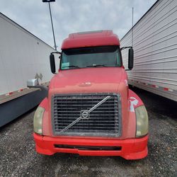 Volvo And Freightliner  Plus Trailer