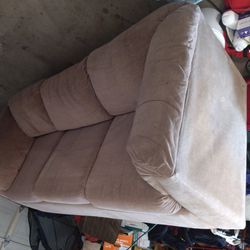 Futon/ Couch With A Fold Out Bed (Unused Bed)