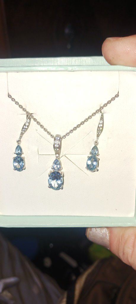 Sterling Silver Blue Topaz Necklace And Earring Set