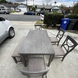 Dining table with 4 chairs and bench good condition