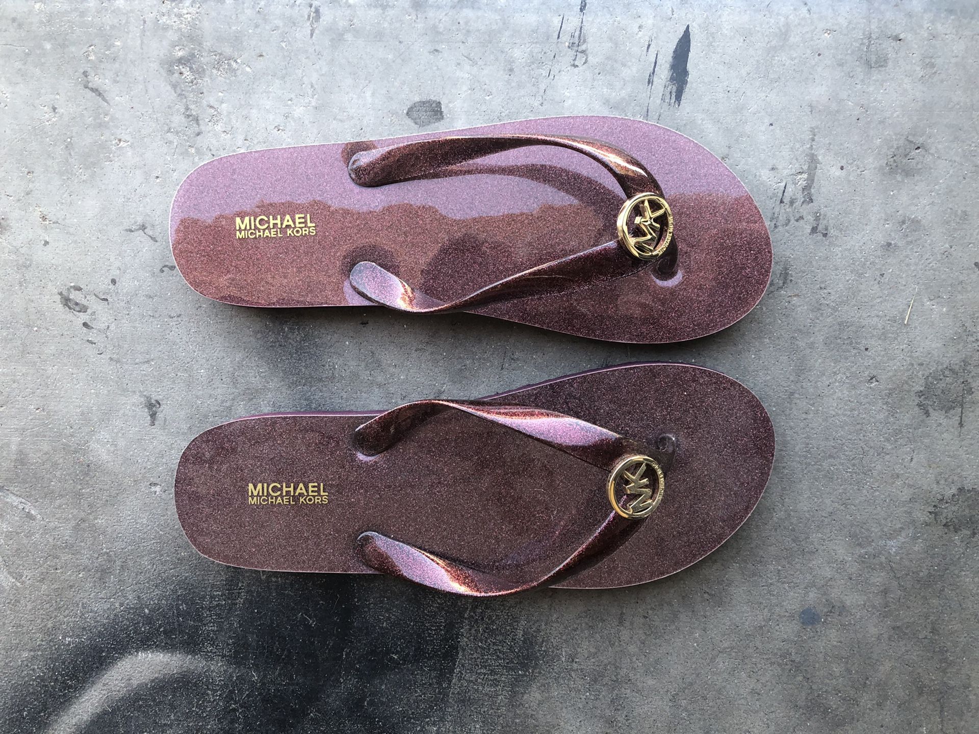 MK flip flops size 8, new