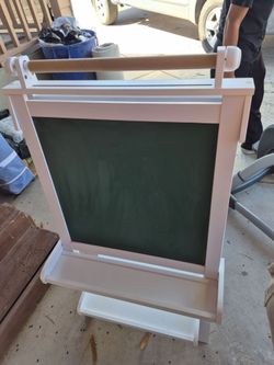 KidKraft Deluxe Wooden Easel features both chalkboard and dry-erase surfaces
