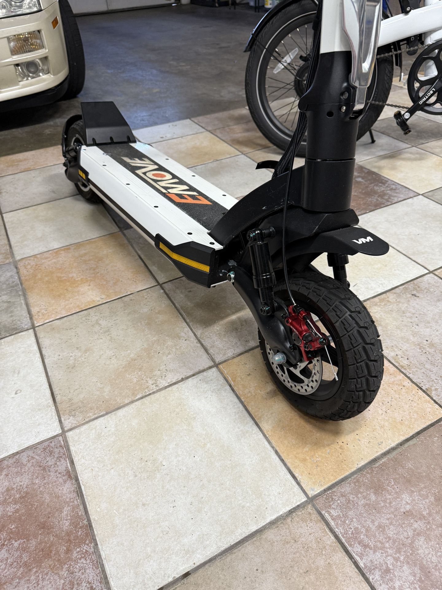 EMOVE Cruiser V2 – 52V Quad Suspension 62-Mile Long-Range Scooter