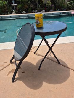 Small folding glass top table