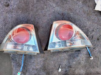 2003-2005 Lexus ls300 tail lights with light bulbs and accessories OEM.