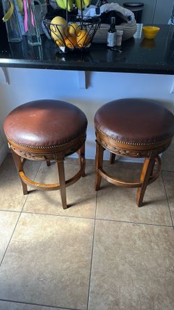$25 leather and wood stools