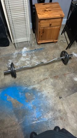 15lb Curling bar + 5 & 10lb Plates