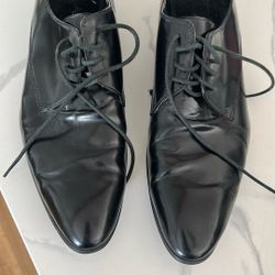 Men’s black dress shoes.