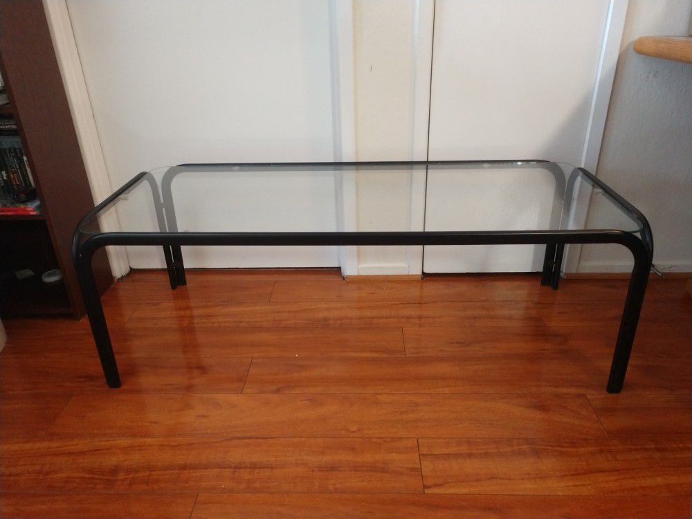 Long metal and glass patio table
