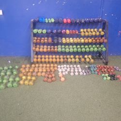 Multi Pound Dumbells And Rack